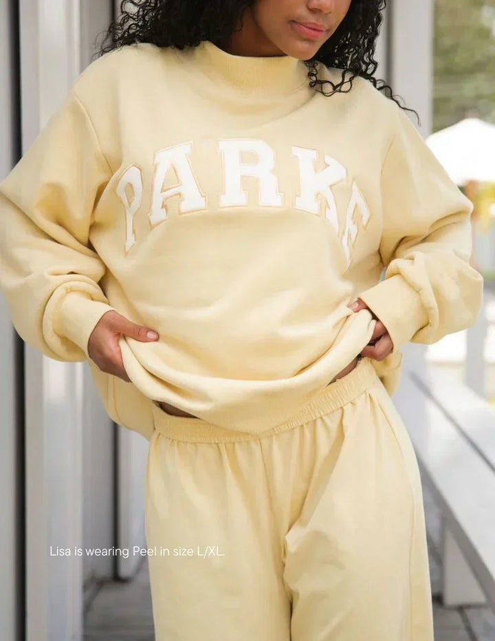 Varsity Mockneck Pastel Yellow with Navy Letters